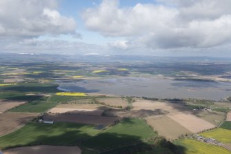 General oblique aerial view of the Montrose Basin, centred on Rossie Castle.