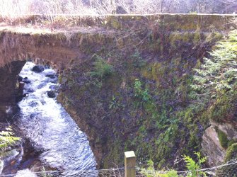 View showing W-facing elevation and recent collapse of the bridge.