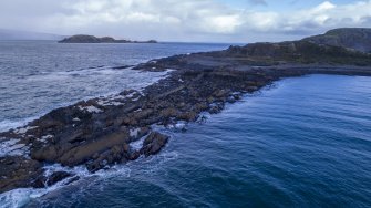 Oblique aerial view of south coastal quarry area, extreme south west tip of Easdale