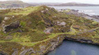 Oblique aerial view of the engine house (left) and boiler house (right) associated with An Lub Chlear and An Toll Mar Luaty quarries