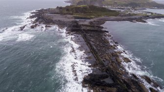 Oblique aerial view of coastal quarries from south