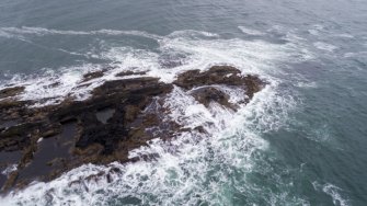 Oblique aerial view of southern tip of south coastal quarries, Rubha nam Faoileann