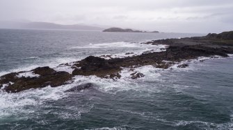 Oblique aerial view of Rubha nam Faoileann, south coastal quarries