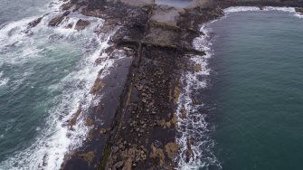 Oblique aerial view of Rubha nam Faoileann, south coastal quarries