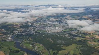 General oblique aerial view of Strathearn centred on Perth.