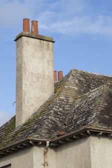 Detail of chimney and Caithness slab roof.