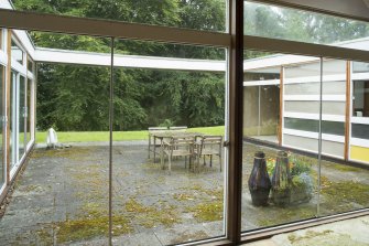 Children's bedroom/playroom. View looking out to courtyard.