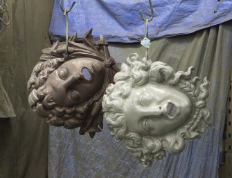 Lost Art Conservation workshop, Wigan. Two female heads in paint spray booth