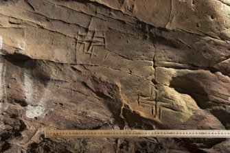 Detail of incised crosses (including scale)