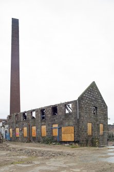 Remains of the fire-damaged possibly pre-1860s building.