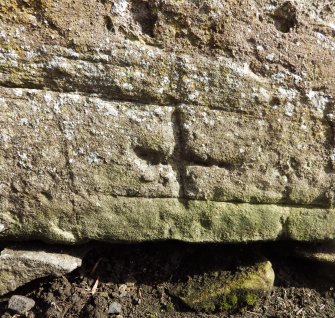 A close-up view of the incised cross from the NW.