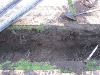 North facing section of trench showing topsoil down whole profile , direction S