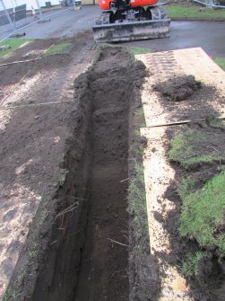 Western end of trench nearly at road, direction W