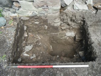 Trench 1. Context (003) in relation to north wall and recess floor level exposed, direction N
