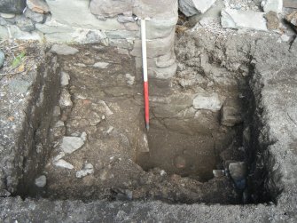 Trench 1. Detail of the exposed part of west side of recess, direction N