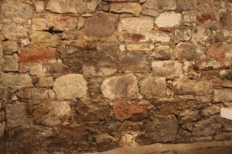 Detail of ruuble masonry wall foundations below Building A, direction facing SW