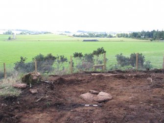 Plate 1: Pre-ex view of a cist associated with the excavation of a cist and cremation burials at Slacknamarnock Quarry, Inverness
