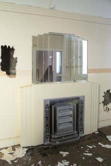 Detail of fireplace and mirror.