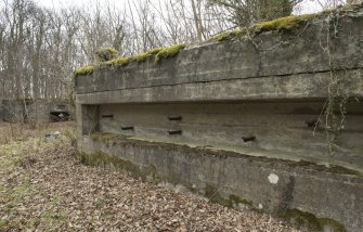 Detail view of NE recess, possibly for tools, on the NW facing wall between the two 9.2-inch gun emplacement, looking north.