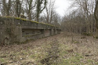 General view of north east facing wall running between the two 9.2-inch gun emplacements looking south.