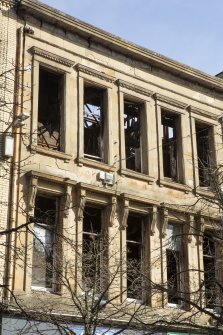 View of fire damaged windows from south west.