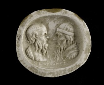 Plaster cast intaglio of two men's heads inscribed 'Socrates' on verso (same as OBJ11).