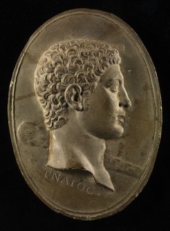 Plaster cast intaglio of a man's head inscribed 'CNATOC'.