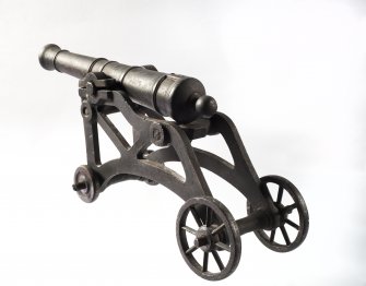 Cast iron model of a cannon.