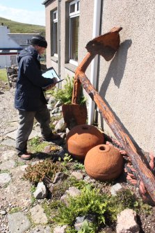 The Balchrick anchor in its current location, outside a local house, being sketched