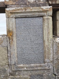 Rodel churchyard. Burial enclosure. Commemorative panel to Norman Macleod of Berneray.