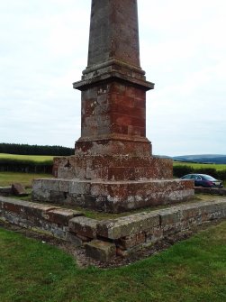 View of monument from the NW. The graffiti is mainly restricted to the stepped base and the pedestal.