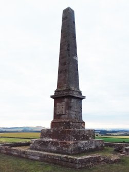 View of monument from the SE. The graffiti is mainly restricted to the stepped base and the pedestal.