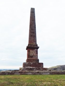 View of monument from the S. The graffiti is mainly restricted to the stepped base and the pedestal.