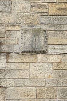 Detail of re-used stone sundial.