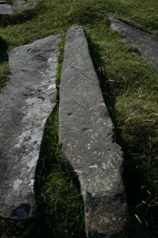Cross incised stone