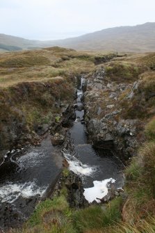 General view of the rock cut channel at the NE end of the aquaduct (NG 3660 9968).