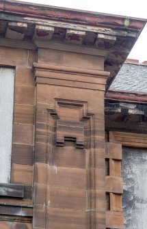 Detail of carved pilaster.