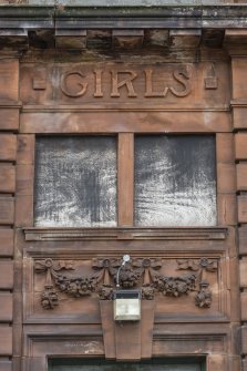 Detail of carving over girls entrance.