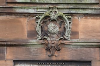 Detail of carved plaque on south face.