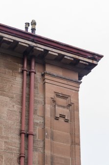 Detail of pilaster and drain finials.