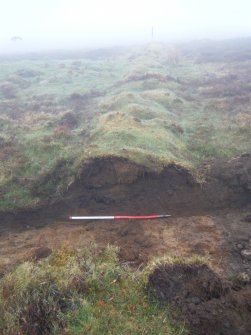 Site 18. Slot C. S-facing section through W side of enclosure.