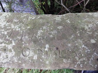 One of several graffiti visible on the parapets of the bridge.