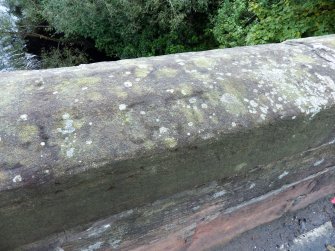 One of several graffiti visible on the parapets of the bridge.