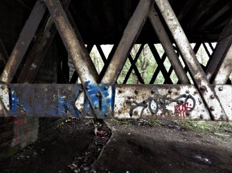 An example of graffiti on the steel latice work supporting the decking.