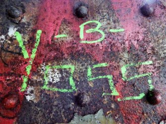 An example of graffiti on the steel latice work supporting the decking.