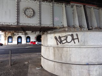 View from S of graffiti on a pier on the west side of the N end of the viaduct.