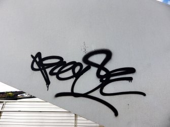 An example of a graffiti tag on the superstructure of the bridge.