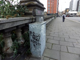 Graffiti on a junction box adjacent to the west parapet of the bridge.