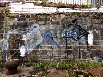Graffiti on wall at the west end of the graving docks.