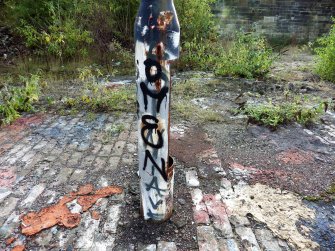 Graffiti on a lamp-post adjacent to south side of graving dock number 3.